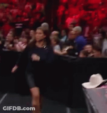 Woman In Green Dress Standing GIF