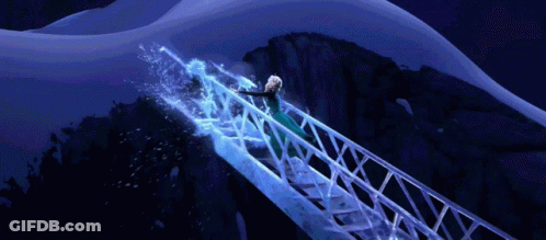 Woman In Green Dress Standing On Bridge Over Water GIF