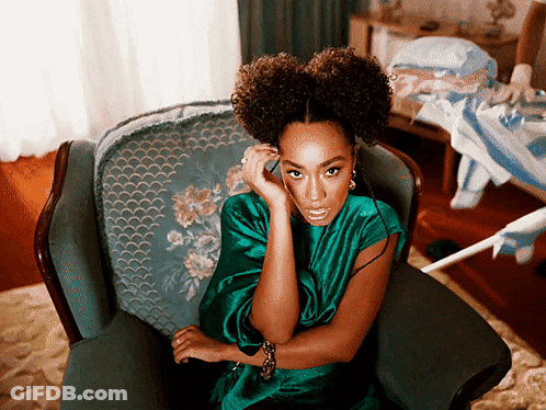 Woman In Green Dress Talking On Cell Phone GIF
