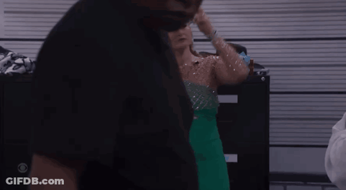 Woman In Green Dress Wearing Crown GIF