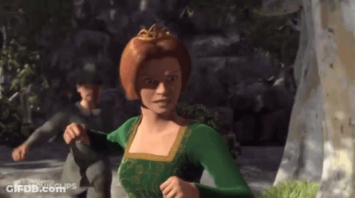 Woman In Green Dress With Crown Running From Man In Gray Shirt GIF