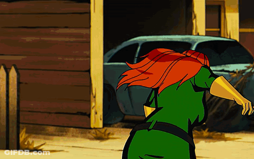 Woman In Green Dress With Red Hair GIF
