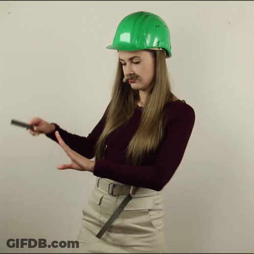 Woman In Green Hard Hat With Mustache GIF