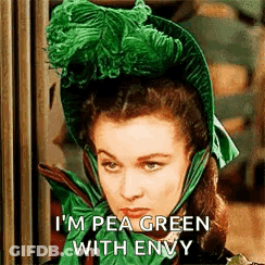 Woman In Green Hat And Green Scarf GIF