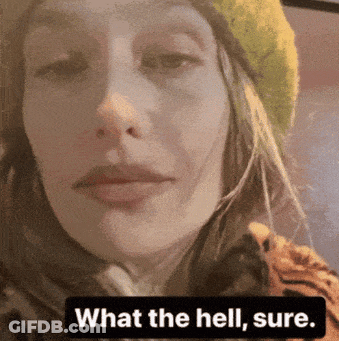 Woman In Green Hat And Tiger Print Shirt Saying What The Hell Sure GIF