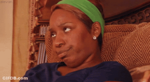 Woman In Green Headband And Earrings GIF