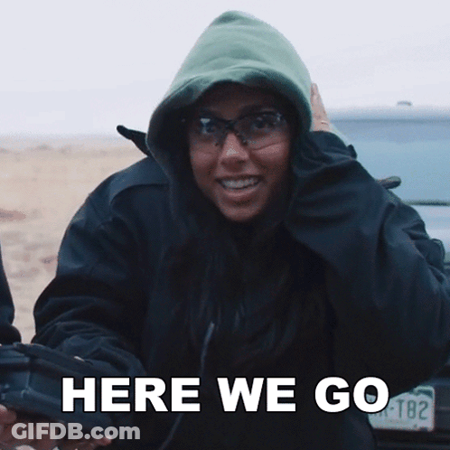Woman In Green Hoodie Saying Here We Go GIF