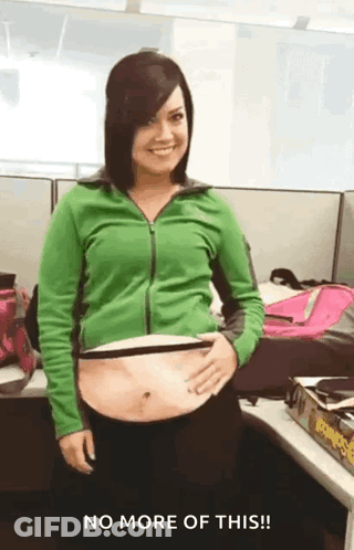Woman In Green Jacket Holding Stomach No More GIF