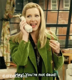 Woman In Green Jacket Says Hey You're Not Dead GIF
