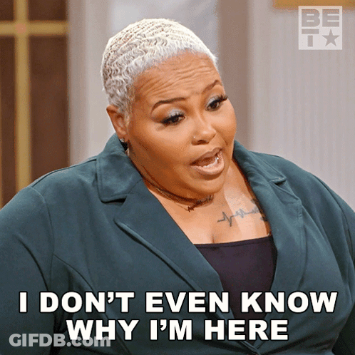 Woman In Green Jacket Says I Don't Even Know Why I'm Here GIF