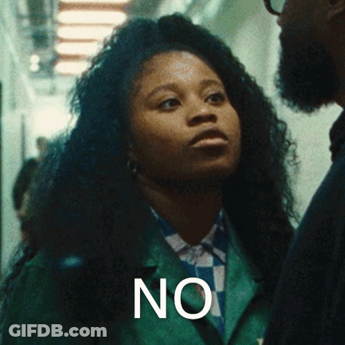 Woman In Green Jacket Standing Next To Man Saying No GIF
