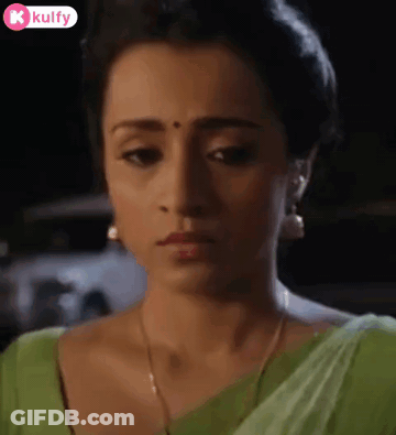 Woman In Green Saree And Earrings Close Up GIF