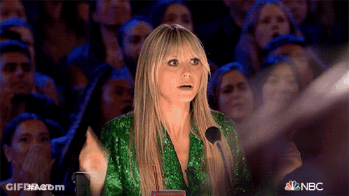Woman In Green Sequined Dress Performing With Crowd GIF