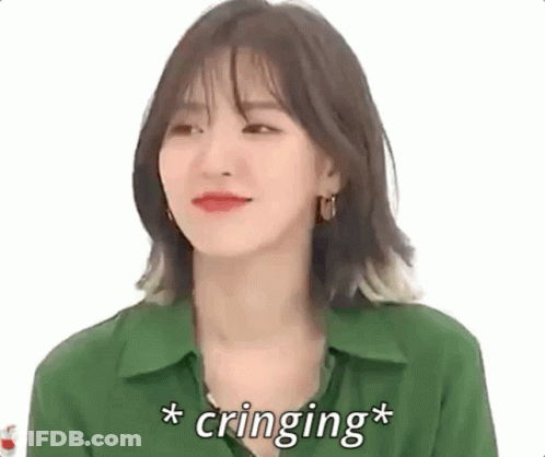 Woman In Green Shirt Making Funny Face Cringing GIF