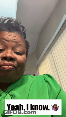 Woman In Green Shirt Making Funny Face Saying Yeah I Know GIF