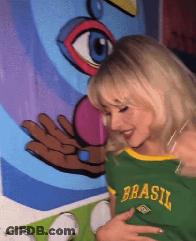 Woman In Green Shirt Saying Brasil GIF