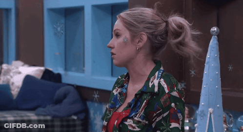 Woman In Green Shirt Saying Christmas GIF