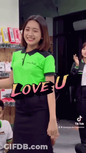 Woman In Green Shirt Saying Love U GIF