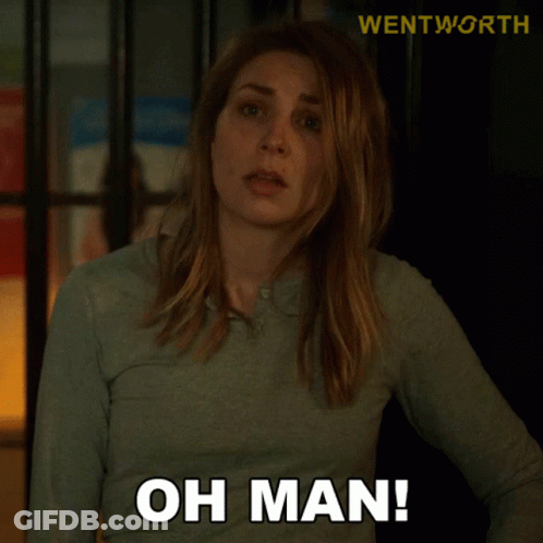 Woman In Green Shirt Saying Oh Man In Front Of Wentworth Sign GIF