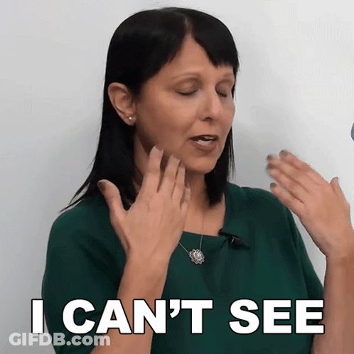 Woman In Green Shirt Says I Can't See GIF