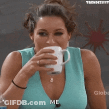 Woman In Green Shirt Smiling On Beach GIF