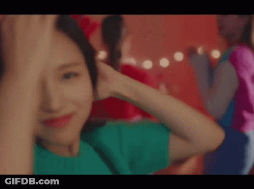 Woman In Green Shirt Smiling GIF