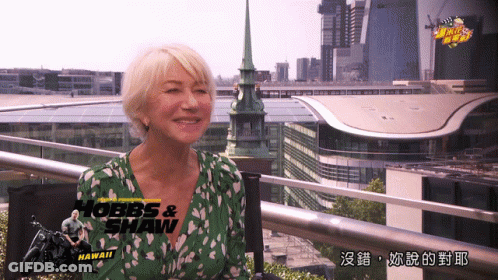 Woman In Green Shirt With Hobbs & Shaw Hawaii GIF