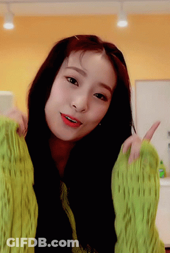 Woman In Green Sweater Giving Thumbs Up GIF