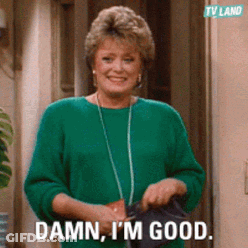 Woman In Green Sweater Holding Purse Saying Damn I'm Good GIF