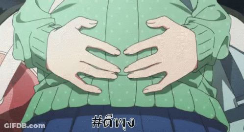 Woman In Green Sweater With Hands On Stomach GIF