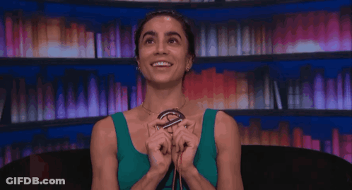 Woman In Green Tank Top Named Morgan GIF
