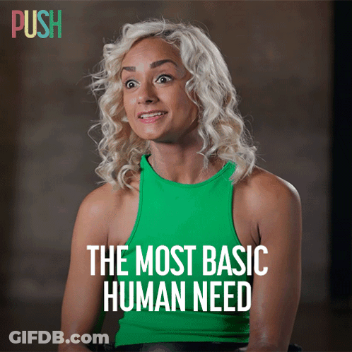 Woman In Green Tank Top Saying The Most Basic Human Need GIF