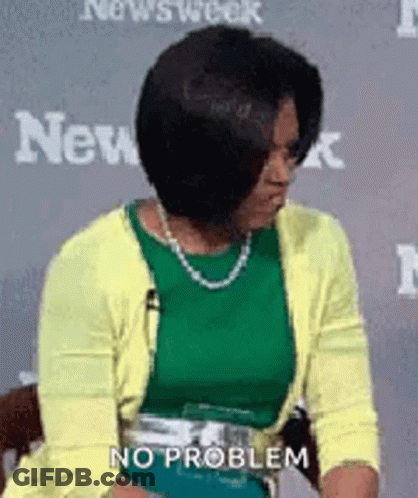 Woman In Green Top And Yellow Cardigan GIF