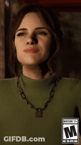 Woman In Green Turtleneck With 17+ Label Necklace GIF