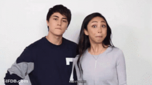 Woman In Grey Maryland Sweater With Man GIF