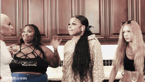 Woman In Gucci Top With Two Women GIF