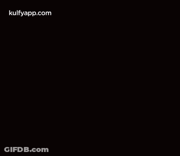 Woman In Hat And Black Shirt Hands On Chin GIF