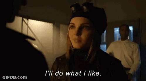 Woman In Hat And Goggles Talking To Man GIF