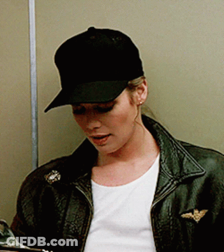 Woman In Hat And Leather Jacket GIF