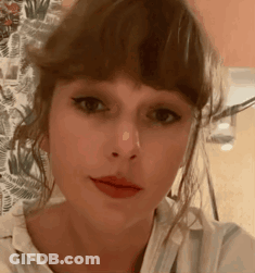 Woman In Hat And Leather Jacket Blowing A Kiss Saying Slayyyy GIF