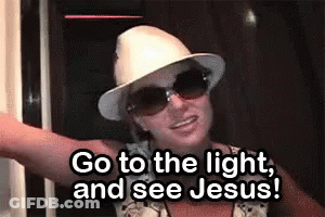 Woman In Hat And Sunglasses Saying Go To The Light GIF