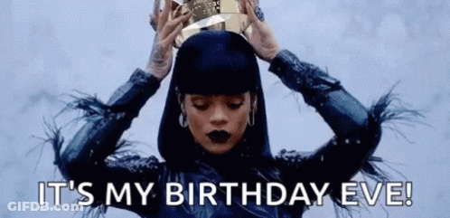 Woman In Hat Holding Trophy GIF