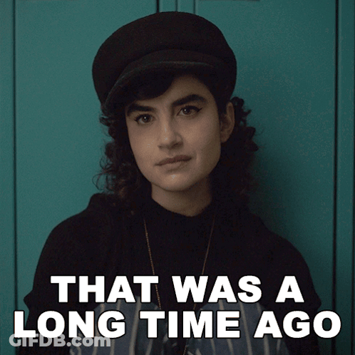 Woman In Hat Saying That Was A Long Time Ago GIF