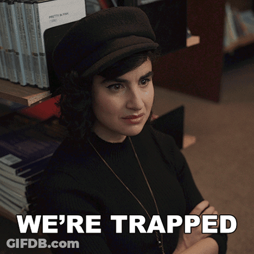 Woman In Hat Saying We're Trapped GIF