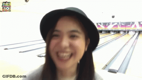 Woman In Hat Smiling At Top 10 Bowling Alley GIF