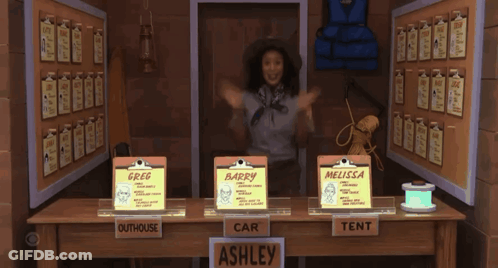 Woman In Hat With Greg Barry And Melissa Signs GIF