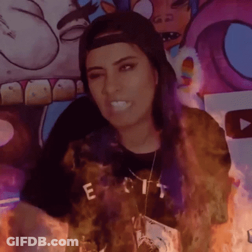 Woman In Hat With T-Shirt Saying Exit Is On Fire GIF