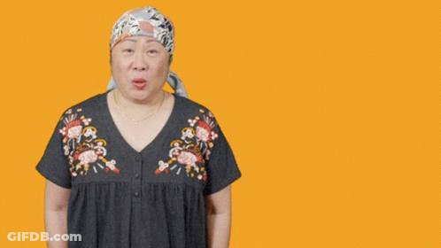 Woman In Head Scarf Making Funny Face Saying Ope GIF