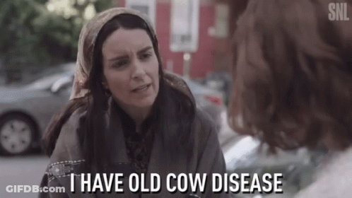 Woman In Head Scarf Saying I Have Old Cow Disease GIF
