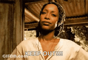 Woman In Head Scarf Says Keep Out GIF